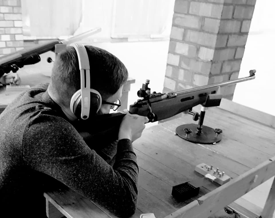 A novice takes aim with a benchrest smallbore rifle